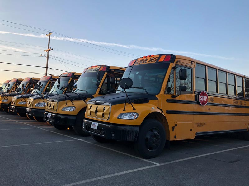 school buses parked in parking lot