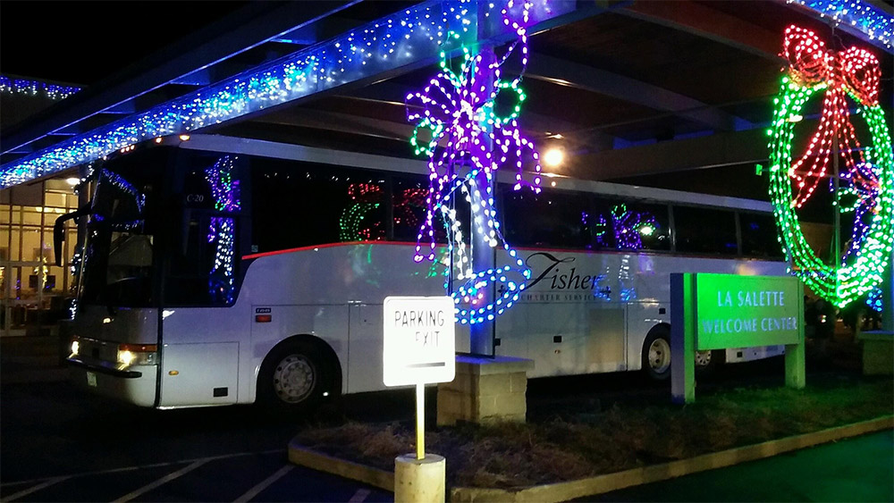 fisher bus surrounded by christmas lights