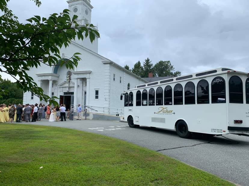 fisher trolly outside of church