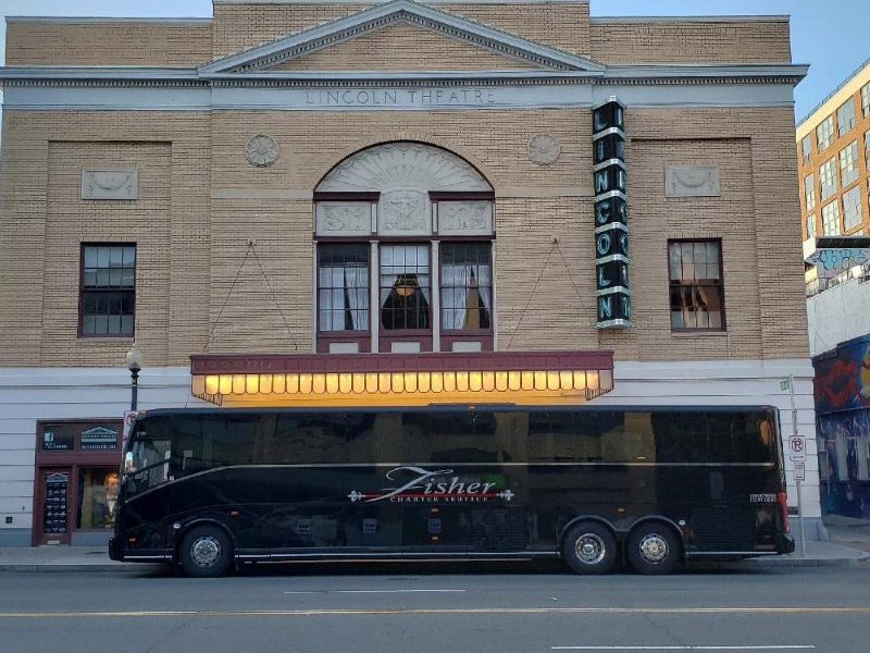 charter bus outside of lincoln theater