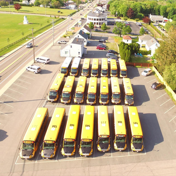 Aerial view of the Fisher Bus Inc school bus fleet